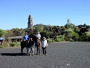 DSC02200 Horseback pose with Angahuan church.jpg